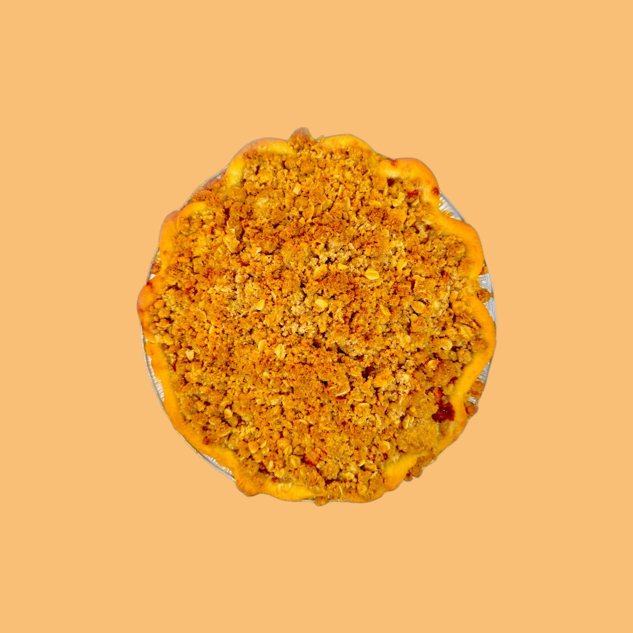 apple crumb pie on an orange background